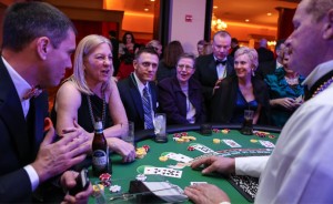 In our website redesign for Contemporary Productions, we placed a focus on imagery that shows the thrill of the experience. Here, event attendees play an exciting round of black jack.