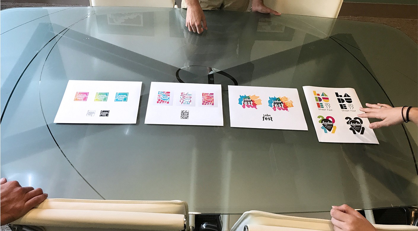 Our graphic design process. Showing initial concepts for the Ladue Street Fest logo design.