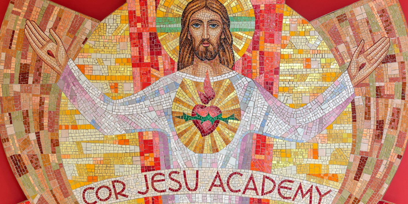 The mosaic that welcomes you to Cor Jesu Academy hangs in the school's lobby.