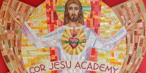 The mosaic that welcomes you to Cor Jesu Academy hangs in the school's lobby.