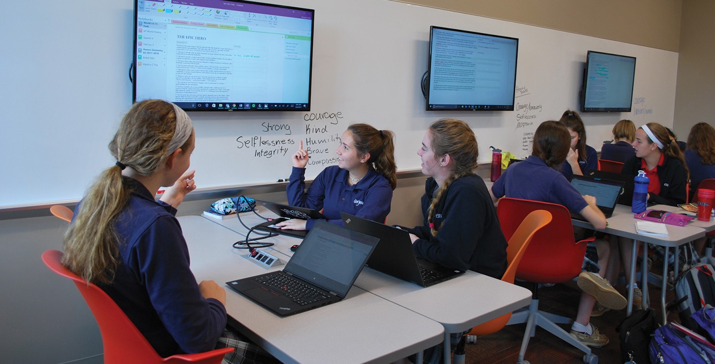 Students working in class at Cor Jesu Academy. Classrooms feature the latest technology for improved collaboration and accelerated learning.