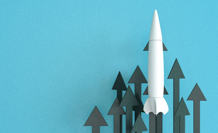 A rocket ship facing upward with upward facing arrows, representing the evolution of brand marketing