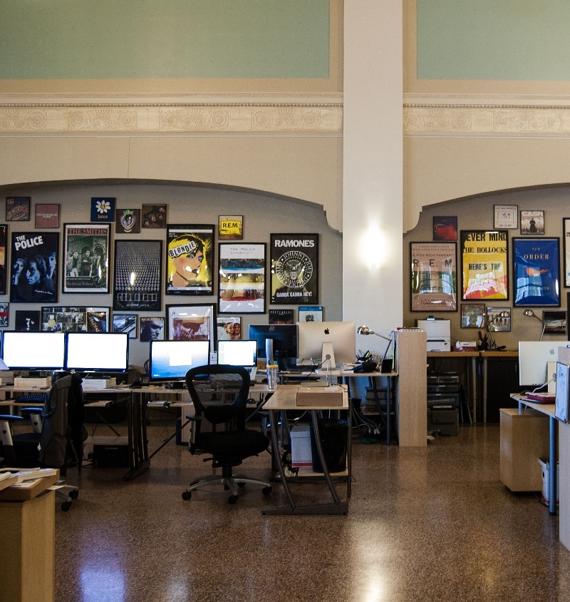 wall featuring band posters